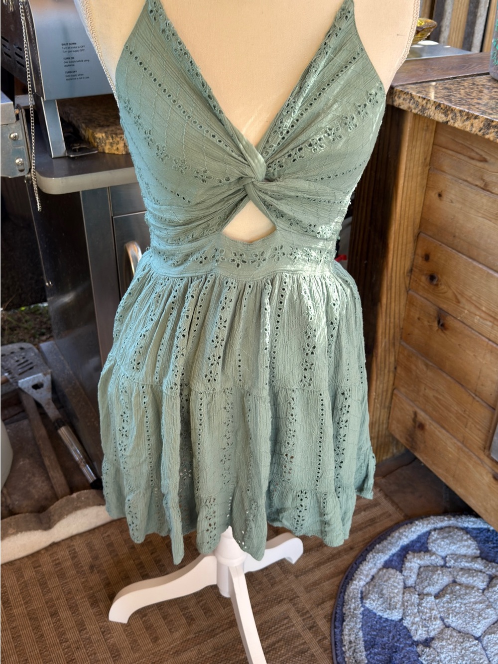 Absolutely adorable sage green mini dress by Angie